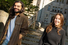 Two graduate students outside the Department of Philosophy.